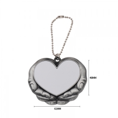 Heart in hand Charm